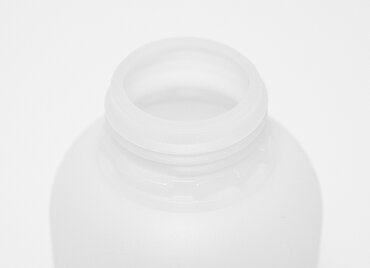 Round bottle fluorinated: 1,0 liter, colour: natural