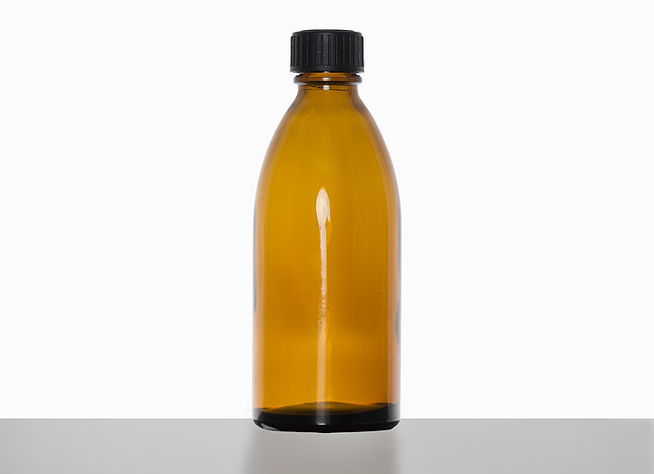 Narrow neck bottle, 150 ml of glass in brown